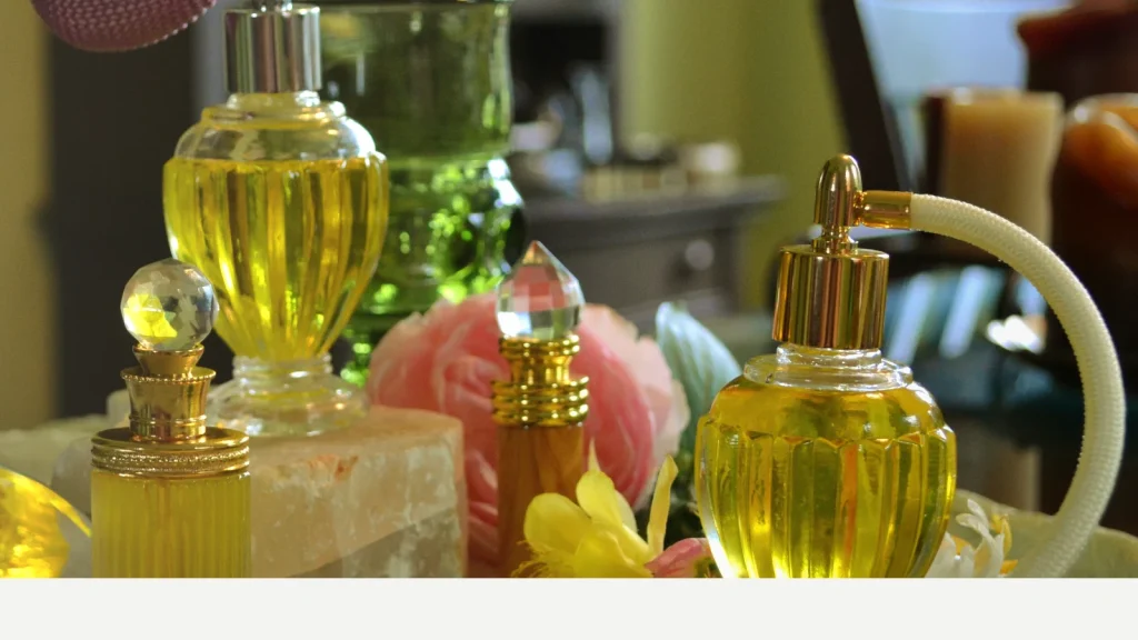 Luxury perfume bottles in a premium real-photo hero image for Jetkrate perfume shipping guide